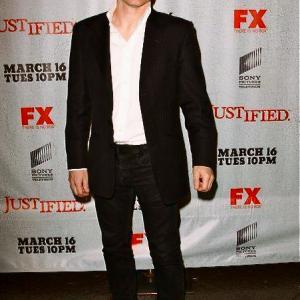 Damon Herriman arrives at the premiere of Justified