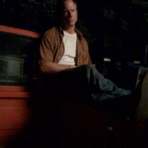 Louis Herthum takes a break on the set of The Last Exorcism