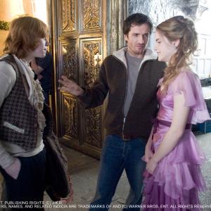 Still of Rupert Grint David Heyman and Emma Watson in Haris Poteris ir ugnies taure 2005