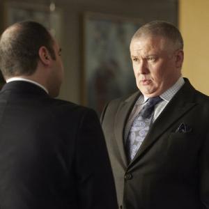 Still of Conleth Hill and Rick Hoffman in Suits 2011