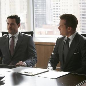 Brendan Hines as Logan Sanders and Gabriel Macht as Harvey Specter in Suits