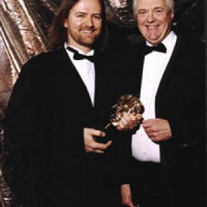 1999, Receiving BAFTA Award for ELIZABETH from Sir Tim Rice