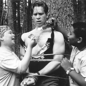 Brawn is no match for brains when Gerry (Aaron Schwartz, left) and Roy (Kenan Thompson, right) take control of the camp and use their clever wits to retaliate against the bully counselors including Lars (Tom Hodges, center), who have made their summer unbearable.