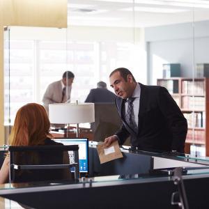 Still of Rick Hoffman and Sarah Rafferty in Suits (2011)