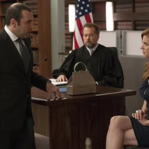 Still of Rick Hoffman and Sarah Rafferty in Suits (2011)