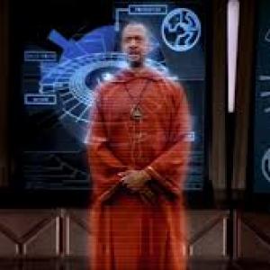 Mark Holden as Brother Thaddeus Blake in Andromeda in a hologram scene