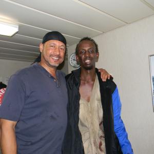 Mark Holden and Barked Abdi taking a break on the set of Captain Phillips in Malta