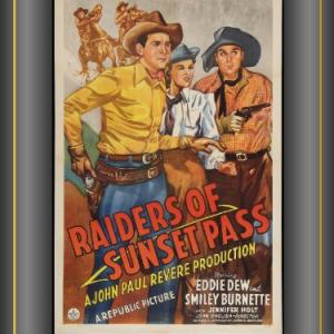 Smiley Burnette Eddie Dew and Jennifer Holt in Raiders of Sunset Pass 1943