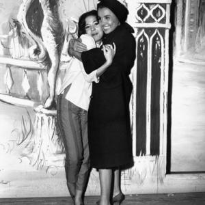 Lena Horne hugs her daughter Gail Jones backstage at the York Playhouse after Miss Jones made her stage debut in the opening performance of the musical Valmouth 10071960