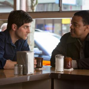 Still of Russell Hornsby and David Giuntoli in Grimm (2011)