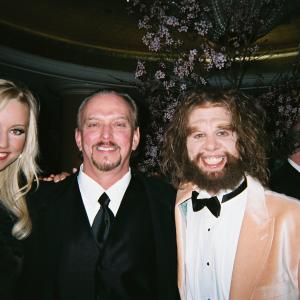 Even the Geico Cavemen get hot babes in Hollywood Thats actordirector Anthony Hornus in the middle so as not to cause confusion The event was The Night of 100 Stars in Beverly Hills on Oscar night