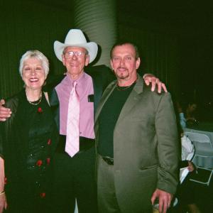 Veteran Hollywood actor Rance Howard center father of famed director Ron Howard A Beautiful Mind How the Grinch Stole Christmas and Cinderalla Man and his wife Judy with actor Anthony Hornus Ghost Town Miracle at Sage Creek An Ordinary Killerat the North Carolna premiere of Ghost Town the Movie