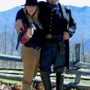 Renee O Connor Xena Warrior Princess and Anthony Hornus Miracle at Sage Creek mug for the camera on the Appalachian Mountain set of Ghost Town