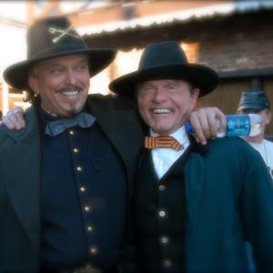 Actors Anthony Hornus left Wicked Spring Miracle at Sage Creek An Ordinary Killer shares a hug with Bill McKinney Deliverance The Outlaw Josey Wales The Green Mile during the wrap of principal photography on Ghost Town an actiondrama filmed in