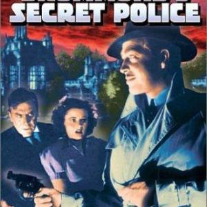 Leo G Carroll Heather Angel and John Howard in Bulldog Drummonds Secret Police 1939