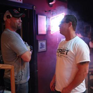 Randy Couture and Lyle Howry on the set of 