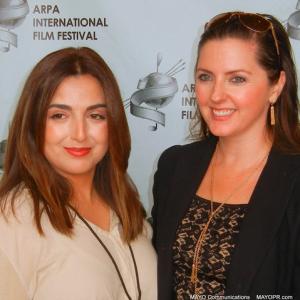 Producers of I Am Neda Nicole Kian Sadighi and Kristina Hughes on the red carpet at the ARPA International Film Festival at the Egyptian Theater in Hollywood CA
