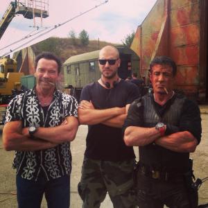 Arnold Schwarzenegger, Patrick Hughes and Sylvester Stallone on set of The Expendables 3.