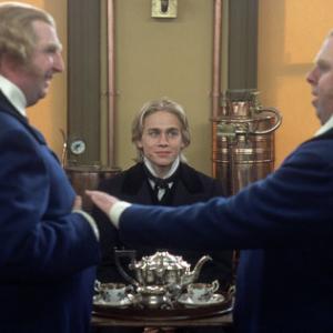 Nicholas Nickleby (CHARLIE HUNNAM) befriends brothers Ned and Charles Cheeryble (GERARD HORAN, left, and TIMOTHY SPALL, right)