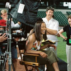 Charles Stone III right directs Angela Bassett center while producer Maggie Wilde left of Stone and Director of Photography Shane Hurlbut right of Bassett look on