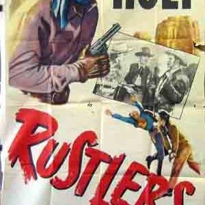Tim Holt and Martha Hyer in Rustlers 1949