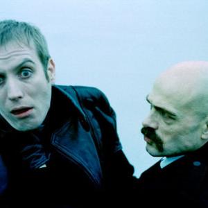 Olegar Fedoro and Rhys Ifans in Rancid Aluminium 2000