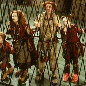 The Clock family - Peagreen (Tom Felton), Homilly (Celia Imrie), Pod (Jim Broadbent) and Arrietty (Flora Newbigin) behind bars.