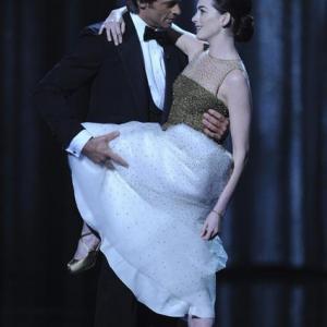Hugh got game - Here with Anne Hathaway, Hugh Jackman sang and danced his way through his hosting gig for the Oscars, bringing a little Broadway charm to Hollywood.