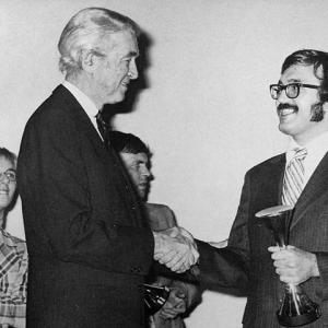 James Stewart presents Storm 2nd Unit DP Andrew Jaremko with an award for VOODOO at the 10 Best Films awards London 1975