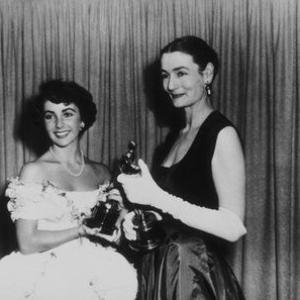 Academy Awards 21st Annual Elizabeth Taylor and Dorothy Jeakins who presented Ms Jeakins with Best Costume Design Award for Joan of Arc