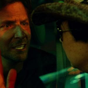 Still of Bradley Cooper and Ken Jeong in Pagirios 3: velniai zino kur (2013)
