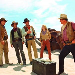 Still of John Wayne AnnMargret Rod Taylor Christopher George and Ben Johnson in The Train Robbers 1973