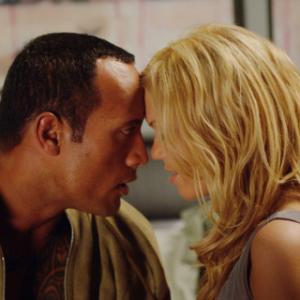 Still of Dwayne Johnson and Mandy Moore in Southland Tales (2006)