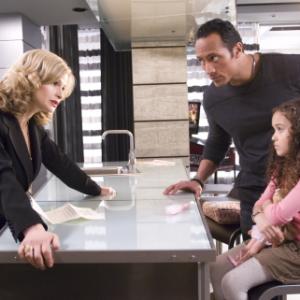 Still of Kyra Sedgwick Dwayne Johnson and Madison Pettis in The Game Plan 2007