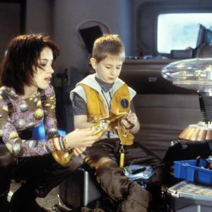 Still of Lacey Chabert and Jack Johnson in Lost in Space 1998
