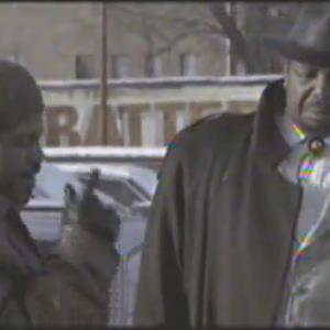Ice Cube and Big LLou Johnson in a scene from the first Barbershop.