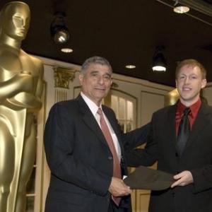 Ron Mardigan awarding a 2006 Nicholl Fellowship in Screenwriting to Arthur Jolly