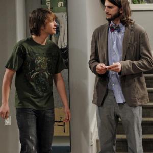 Still of Ashton Kutcher and Angus T Jones in Two and a Half Men 2003