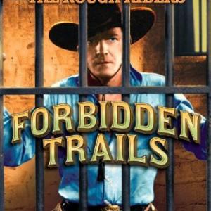Buck Jones in Forbidden Trails (1941)