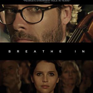 Guy Pearce and Felicity Jones in Breathe In (2013)