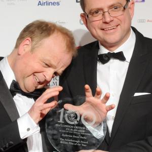 Toby Jones and Stevie Heywood pose in The London Film Critics Film Awards press room on January 20 2013 in London England