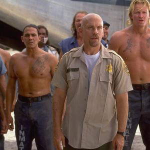 Intense scene from the Actioner CON AIR,from left to right, Ty Granderson Jones (Blade), Emilio Rivera (Carlos), John Malkovich (Cyrus the Virus)and Conrad Goode (Viking) as the gang stare down the Federal Marshals approaching from the horizon!