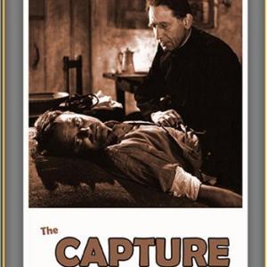Lew Ayres and Victor Jory in The Capture (1950)