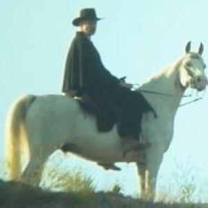 Greg Joseph on horseback (a purebred Arabian named Shades of Baloo) as The Soulless Gunfighter in 
