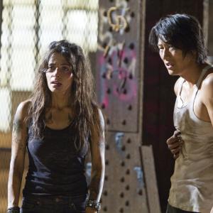 Still of Sung Kang and Sarah Shahi in Bullet to the Head (2012)