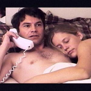 Nick (Harley Kaplan) & Krista (Janet Dougherty) in bed.
