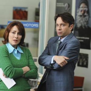 Still of Patricia Heaton and Chris Kattan in The Middle 2009