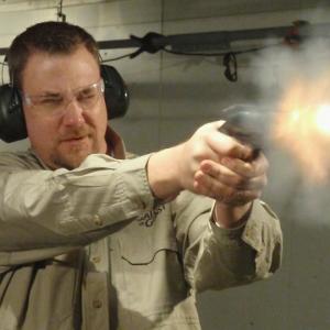 Bo firing rounds at the range on Gallery of Guns