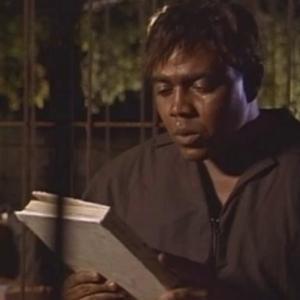 Kirk Kelleykahn as Tony in Cult Film Learning Curve Caged Scene  Reading Langston Hughes