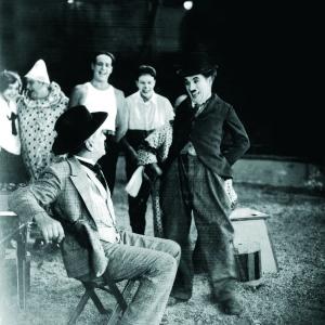 Still of Charles Chaplin Al Ernest Garcia and Merna Kennedy in The Circus 1928